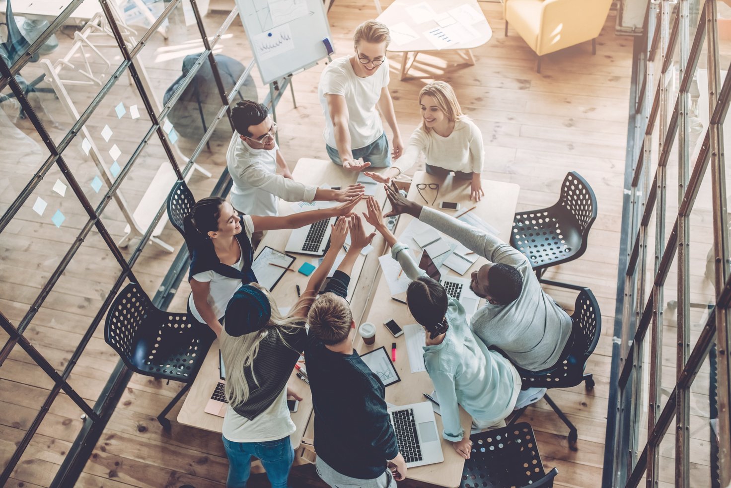 Young people work in modern office.